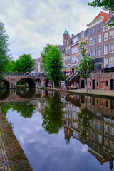 Fototapeta na wymiar Utrecht, The Netherlands - June 07 2022: A bridge over the Oudegracht canal in summer