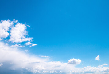 Soft focused view of beautiful thunderclouds. Beautiful dramatic blue sky background with fluffy clouds.