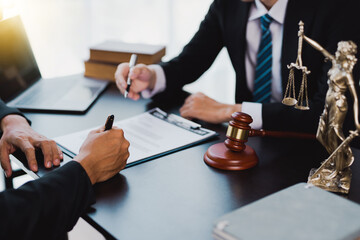 Businessman and lawyer discuss the contract document. Treaty of the law. Sign a contract business.