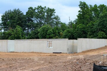Fototapeta na wymiar new concrete foundation for a new house