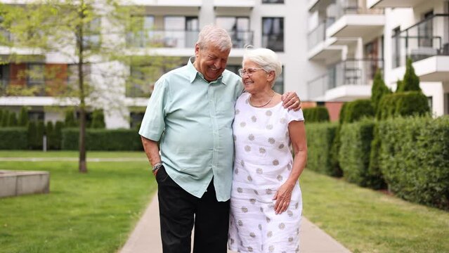 Senior couple in love walking in the park 

