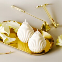 Elegant wax candles and accessory set.