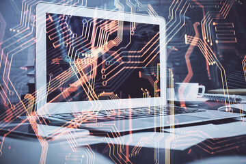 Computer on desktop in office with technology theme hologram. Multi exposure. Tech concept.