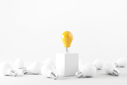 Minimal idea of yellow light bulb on cube surrounded with white bulbs on white background. 3d rendering. Idea creative Concept. Copy space.