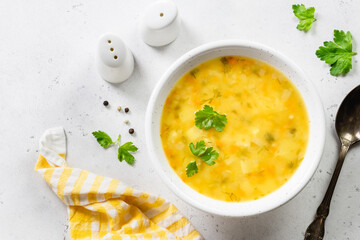 Paprika spicy yellow vegetable soup. Top view, copy space.