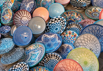 Painted ceramic plates on sale in Marrakech souks, Marrakesh, Morocco - 510897254