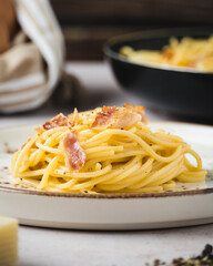 Italian spaghetti carbonara with bacon eggs and cheese