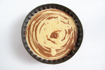zebra pie dough in baking dish. Top view