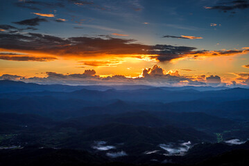 Majestic blue mountains landscape in sunset sky with clouds , Chiang mai , Thailand
