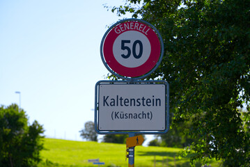 Traffic sign on a sunny summer day near village of Forch, Canton Zürich. Photo taken June 8th, 2022, Forch, Switzerland.