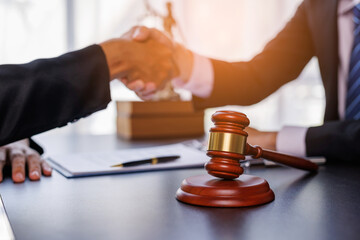 Male lawyers working at the law firms. Judge gavel with scales of justice. Legal law, lawyer,...