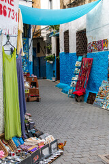 sale of typical objects in the blue streets in the city of Chefchaouen, Morocco
