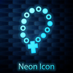 Glowing neon Rosary beads religion icon isolated on brick wall background. Vector