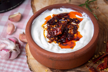 Traditional Turkish and Greek Meze with chili peppers. Turkish Appetizer Atom with yogurt. Turkish atom meze