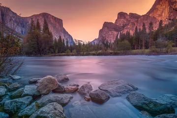 Fotobehang Merced River flows through Yosemite valley in Yosemite National Park, during golden hour , CA, USA © Avik