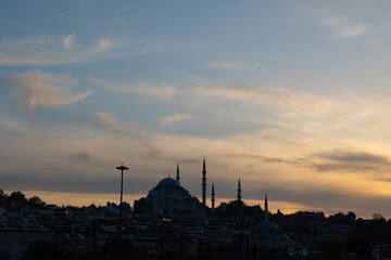 Silhouette of Suleymaniye Mosque at sunset. Istanbul background photo.