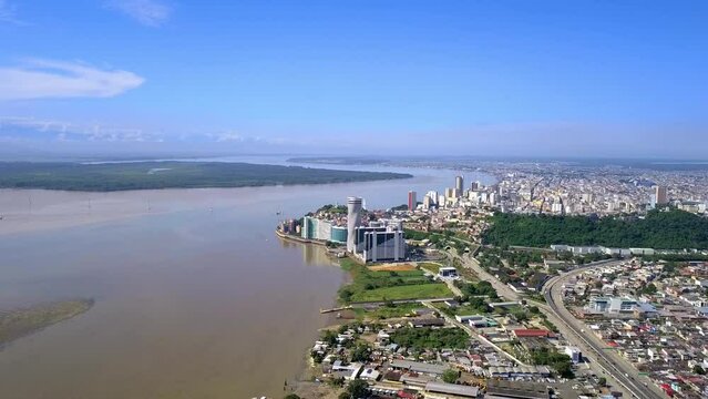 Aerial footage of Guayaquil Santa Ana Port and Guayas River during COVID-19 Pandemic with almost empty streets low traffic