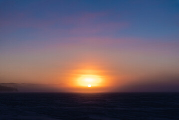 Winter frozen lake scene in northern Canada on a stunning arctic Canadian landscape in the north. 