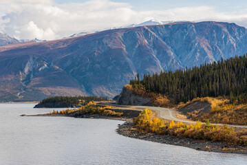 Fototapeta premium Landscape, road trip scenes in Yukon Territory, during fall, autumn. Canadian travel, tourism. 