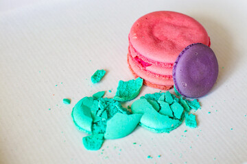 Colored makoruns crumbly multi-colored recipe. Dessert on a plain background cafe menu