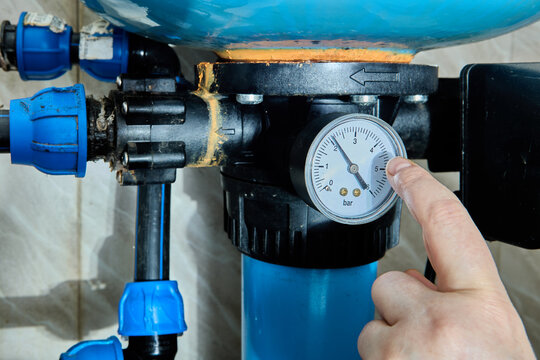 Pressure gauge is display pressure in system during testing of automatic water supply control system.