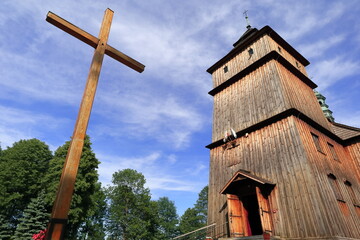 Zabytkowy drewniany Kościół parafialny pw. świętych Stanisława i Wojciecha wybudowany w...