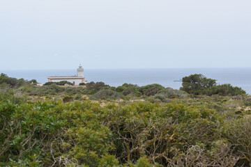 Fototapeta na wymiar Lighthouse at Far de Cap Blanc in Mallorca, Spain
