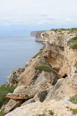 Fototapeta na wymiar Steep coastal cliffs at Cap Blanc in Mallorca, Spain