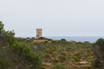 Fototapeta na wymiar Defense tower in Cap Blanc, Mallorca. Torre de Vigilància del Cap Blanc