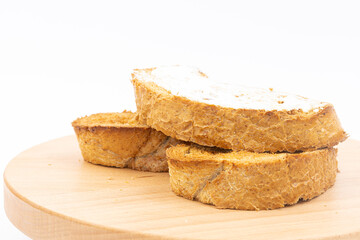 Baked bread with olive oil on the baking pan