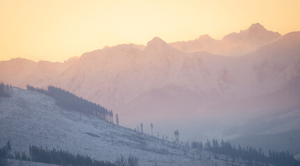 Colorful winter sunrise above mountain range, Slovakia, Europe