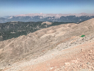 sandy mountains with green plants. mounds of white sand, huge mountains. tourism to a warm country, travel to the mountains