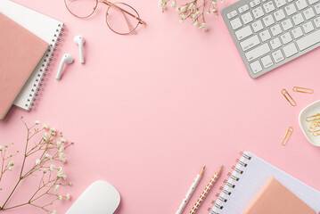 Business concept. Top view photo of workplace keyboard computer mouse reminders clips pencils glasses earbuds white gypsophila flowers on isolated pastel pink background with copyspace in the middle