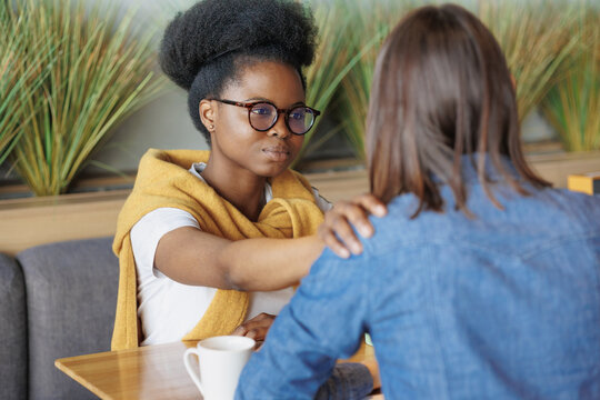 moral support and mental health, African American woman supporting a colleague in a difficult situation, words of support or help with advice, communication between patient and psychologist, spiritual