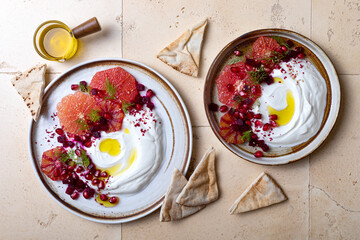 Labneh middle eastern lebanese cream cheese dip. Labneh with grapefruit,  roasted beetroot,...