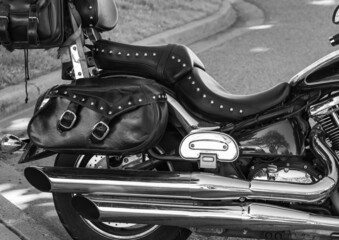 Leather seat of ancient motorcycle outdoor. Motorcycle seat. Big Bike seat.