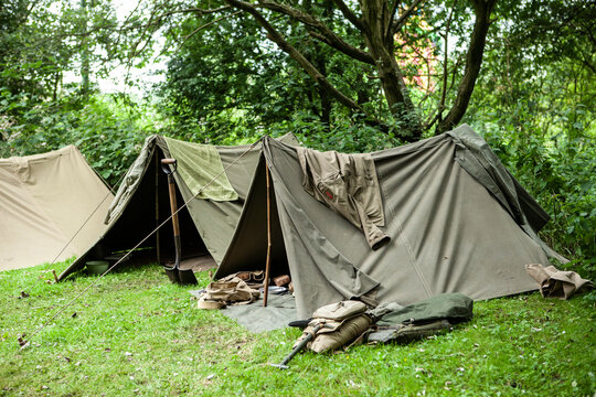 American army tents and soldiers helmets