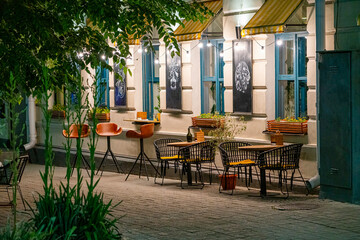 outdoor cafe in the evening without people
