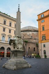 Fototapeta na wymiar Elephant and Obelisk is a statue of an elephant carrying an obelisk, designed by the Italian artist Gian Lorenzo Bernini in the Piazza della Minerva in Rome