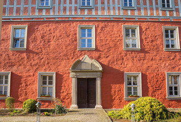 Fototapeta na wymiar Red facade of a historic house in Aschersleben, Germany