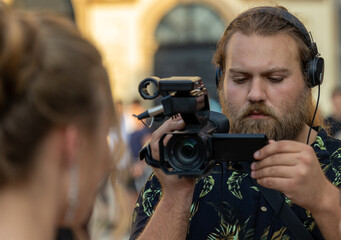 Obraz premium Cameraman behind the scene working