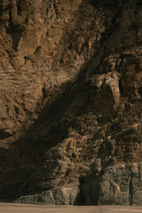 landscape with naked man alone among rocky mountains