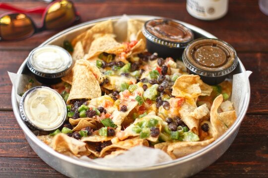 Mexican nachos with checken and souces