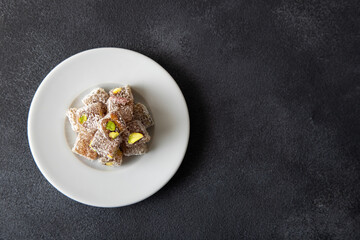 Traditional pistachio Turkish delight in a plate
