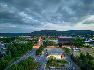 Late afternoon, early evening aerial image of Corning NY looking southwest toward the city