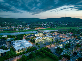 Late afternoon, early evening aerial image of Corning NY looking southwest toward the city