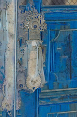 Old door with elaborate antique handle. - 510947450