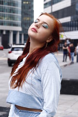 Fototapeta premium portrait of a young woman beauty girl red hair