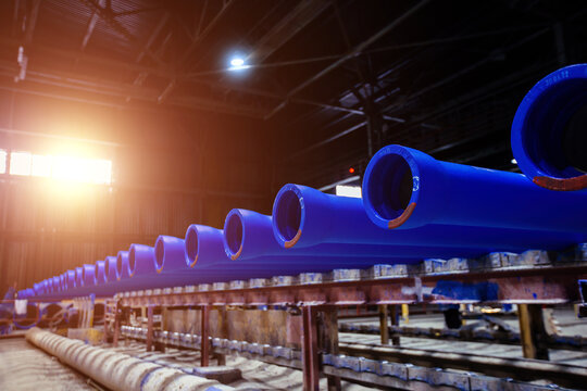 New cast iron pipes for pipeline construction in warehouse