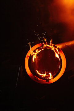 Freshly cast iron pipe at the foundry, close up